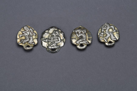 khazar belt fittings with human figures