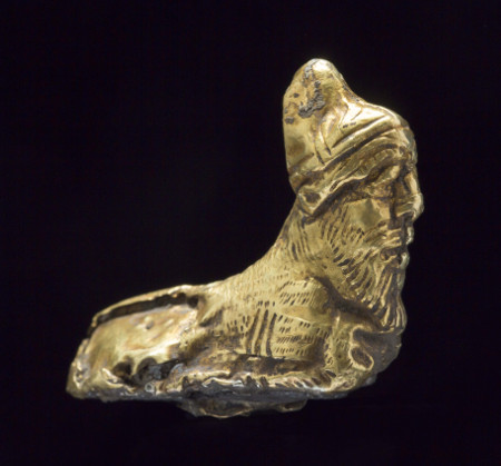 Human-headed bull figure